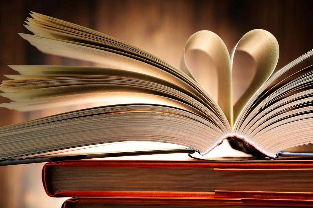Hardcover book with two pages formed in the shape of heart